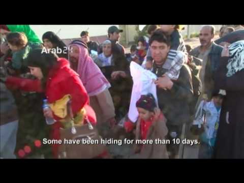 Iraqi families evacuate amid battle with IS