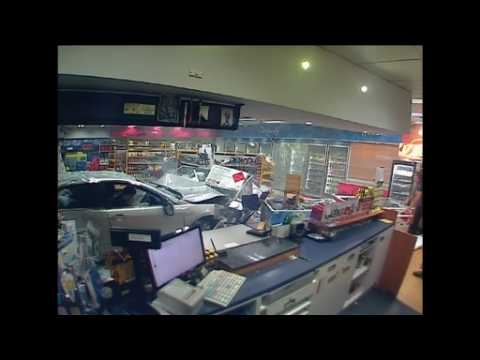 CCTV footage shows car ramming into Sydney gas station