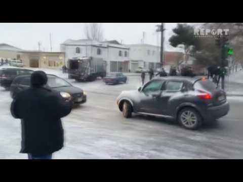 Frost turns Azerbaijan street into ice rink for cars
