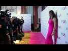Elizabeth Hurley parties in pink with a purpose