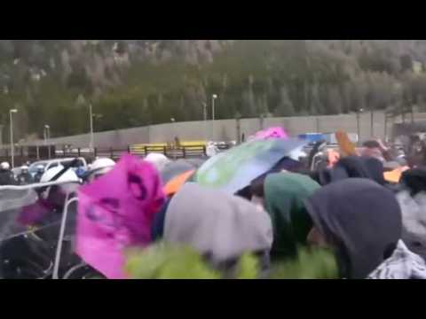 Scuffles break out between police and protesters at Italy-Austria border