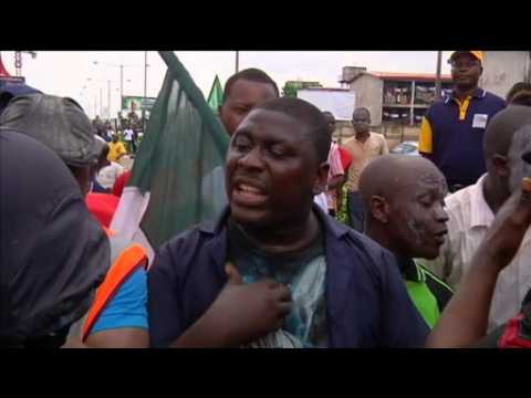 Nigerians defy strike ban after fuel hikes
