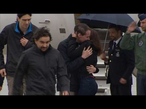 Three Spanish journalists return home after Syria kidnap ordeal
