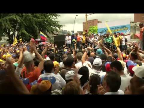 Opposition protesters rally in Caracas against Maduro