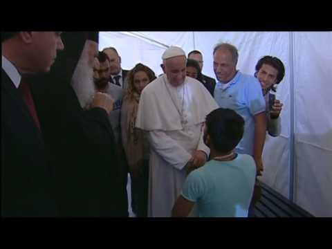 Migrants weep as Pope visits Greek refugee camp