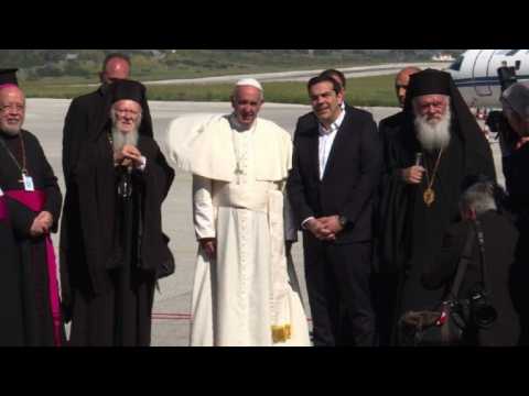 Pope Francis met by Tspiras on Greek island of Lesbos