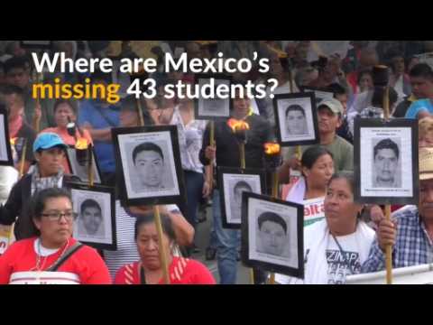 Thousands protest over investigation into missing 43 students in Mexico