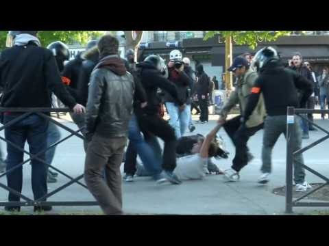 Protesters clash with police at Paris May Day marches