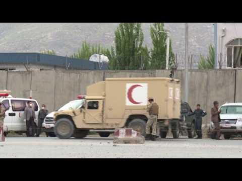 Taliban suicide bombing, gunfire rattle central Kabul