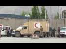 Taliban suicide bombing, gunfire rattle central Kabul