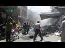 Amateur video shows aftermath of air strike on Idlib market