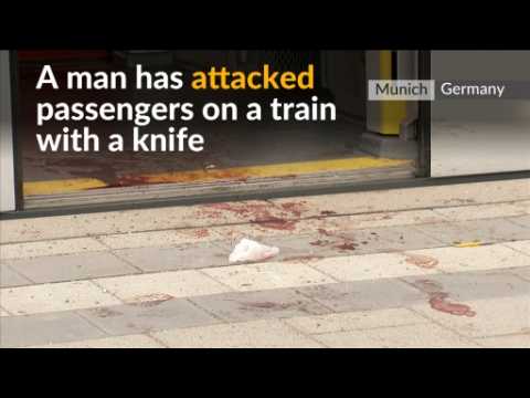 Man knifes rail passengers at German train station