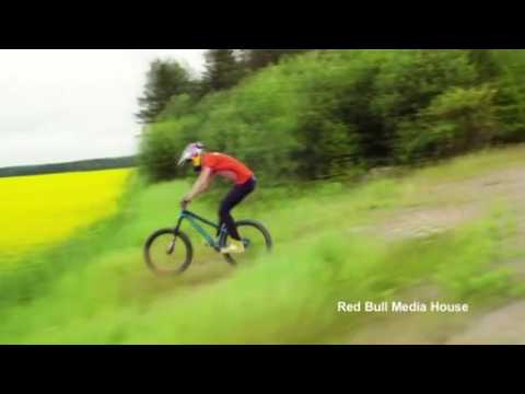 Bike riders freestyle their way through a blooming Swedish field