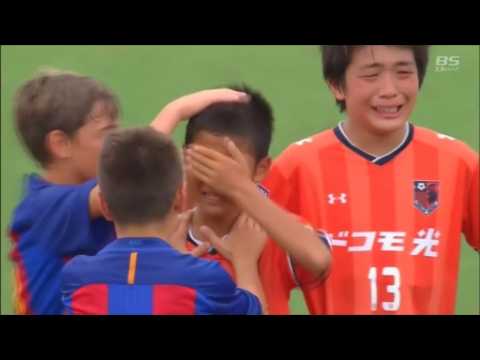 Barcelona youth soccer team consoles Japanese opponents