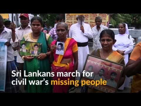 Families of people missing in Sri Lanka's civil war march in silence