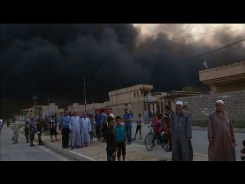 Dark skies over Iraqi town freed from Islamic State