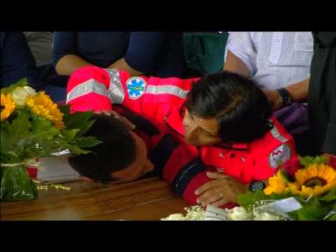 Emotional state funeral for Italy's quake victims