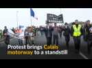 Trucks and tractors block Calais motorway in protest against flow of migrants