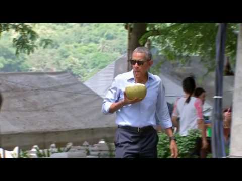 Obama sips coconut in Laos