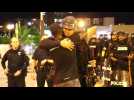Peace activist tries to calm Charlotte protests with free hugs
