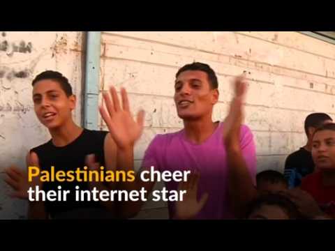 Palestinian internet sensation brings joy by singing about cats and trousers