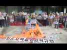 Kim Jong Un effigy burnt in Seoul protest