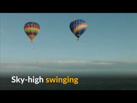 Daredevils reach for the clouds with sky-high swing