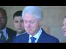 Former U.S. President Clinton pays respects to Peres