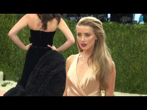 Maybe Sexy Amber Heard Is All About Love And Charity