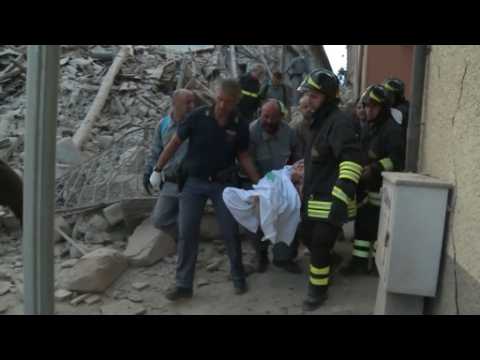 'Voices under the rubble' as Italy quake death toll rises