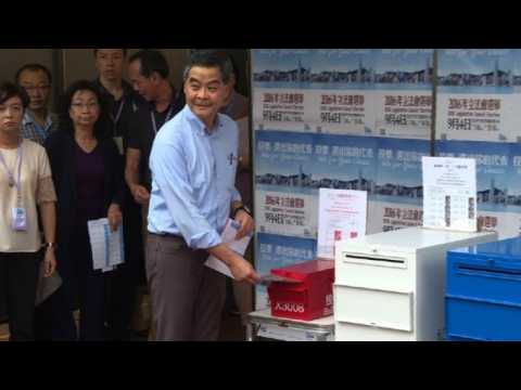 Divided Hong Kong goes to polls as Beijing watches