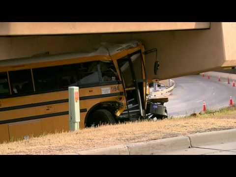 Police: 1 dead, up to 20 injured in Denver school bus crash