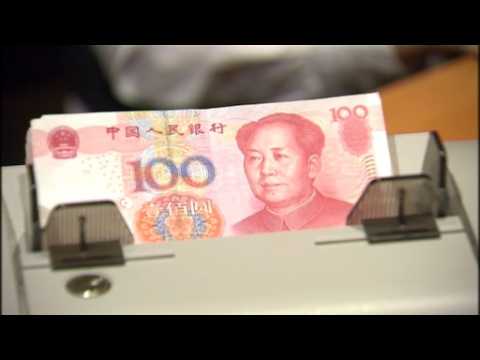 China's Li makes yuan exchange rate promise