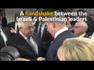 Palestinian and Israeli leaders shake hands at Peres funeral
