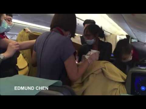 Mobile phone video captures woman giving birth on aeroplane