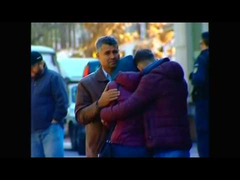 Relatives of Bucharest nightclub fire gather at morgue