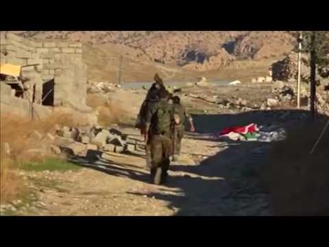 Kurdish militia join battle to retake Iraqi town