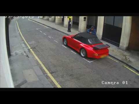 Man caught on CCTV slashing the roof of a porsche and trying to drive it away