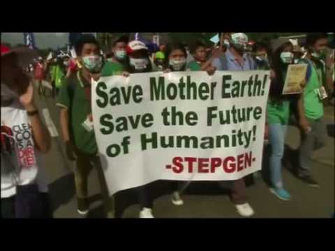 Thousands march ahead of climate summit