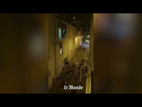 Video shot by French journalist shows people rushing out of theatre during attack