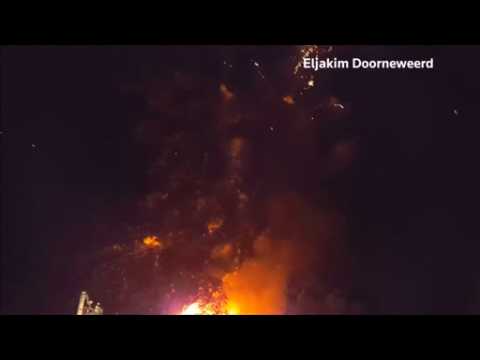 A house explodes in fireworks when it catches fire