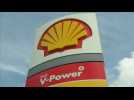 Shell's profits hit by big write-offs
