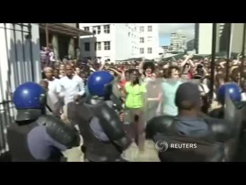 South African police, students clash outside parliament