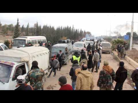 Aleppo civilians, fighters arrive in opposition-held territory