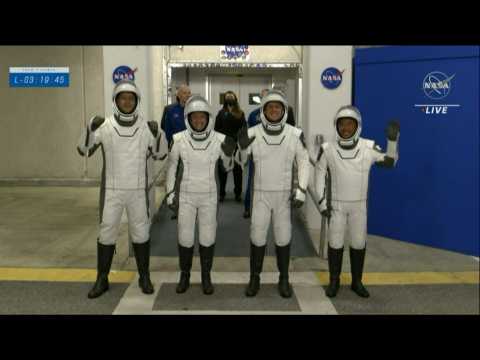 SpaceX team on their way to the Crew Dragon capsule