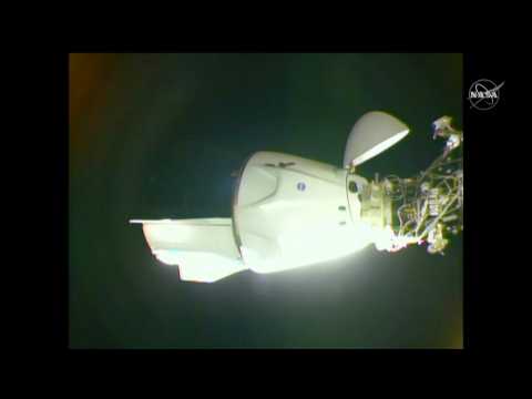 SpaceX Crew Dragon docks with International Space Station