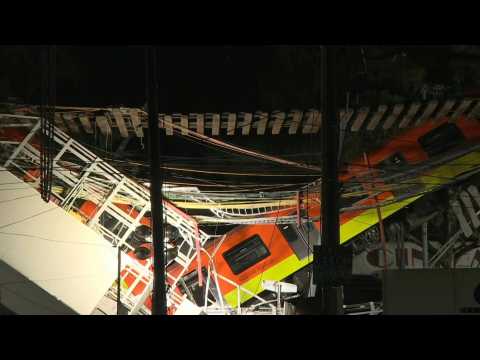 Mexico metro carriages hang from collapsed overpass