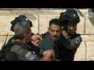 Israeli forces disperse protestors with stun grenades in Jerusalem