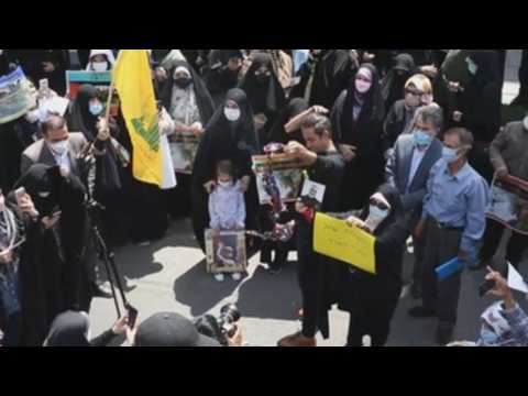 Protesters burn US flag in demonstration in support of Palestine