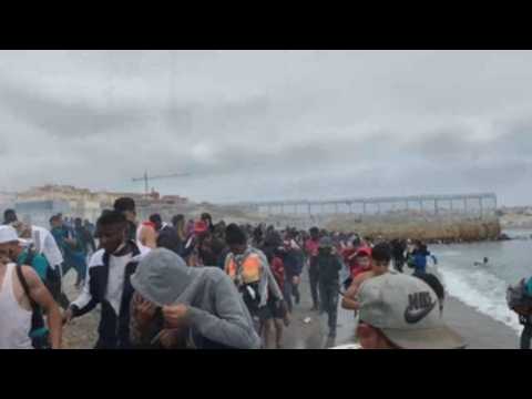 Influx of migrants head to Spain’s Ceuta, thousands breach border